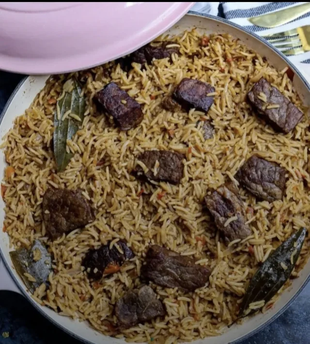 Shades pilau biris — spiced basmati rice with goat meat, straight from the pot